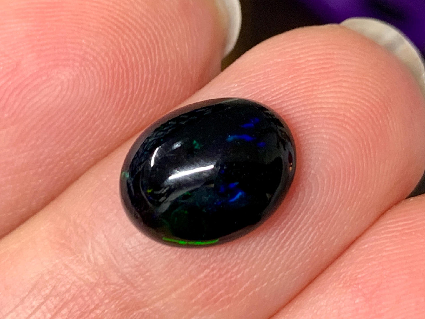 Natural Ethiopian Black Opal 9x11x4mm cabochon
