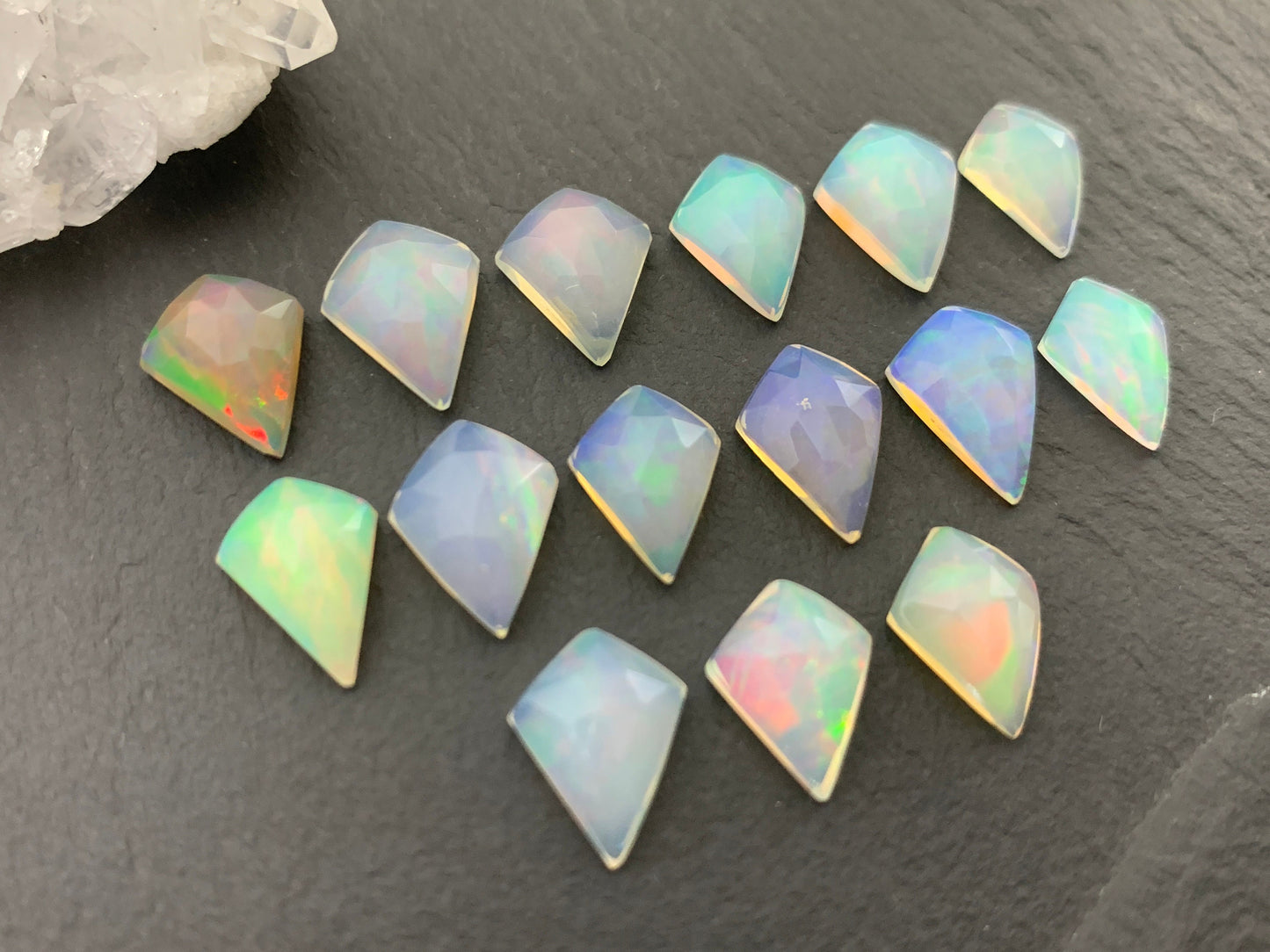 Faceted Welo Opal kite 11-11.8mm cabochon