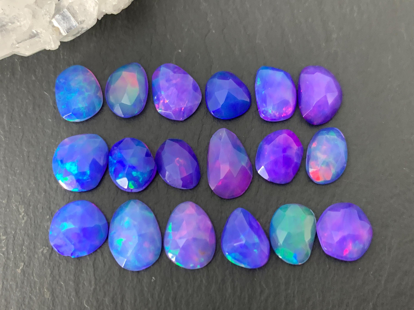Faceted Purple Ethiopian Opal 7-8mm cabochon