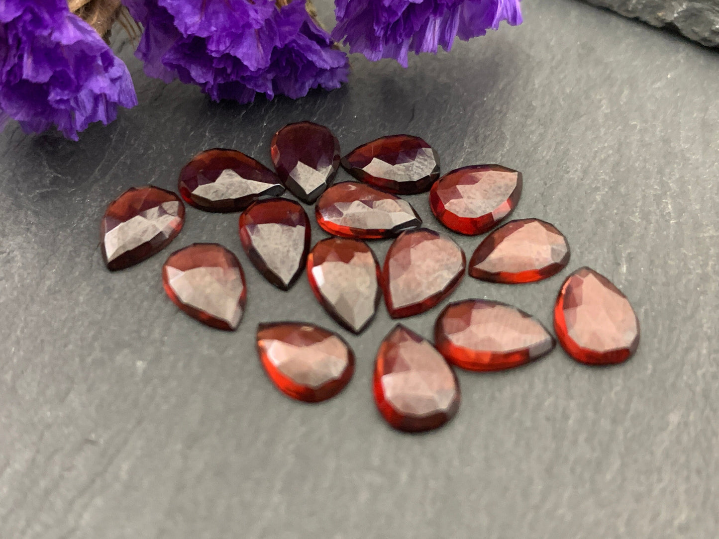 Faceted Hessonite Garnet pear 6x8mm cabochon