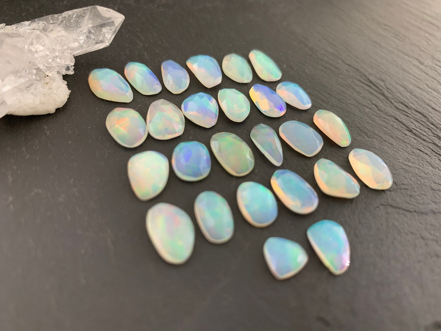 Faceted Ethiopian Opal 9-12mm long cabochon