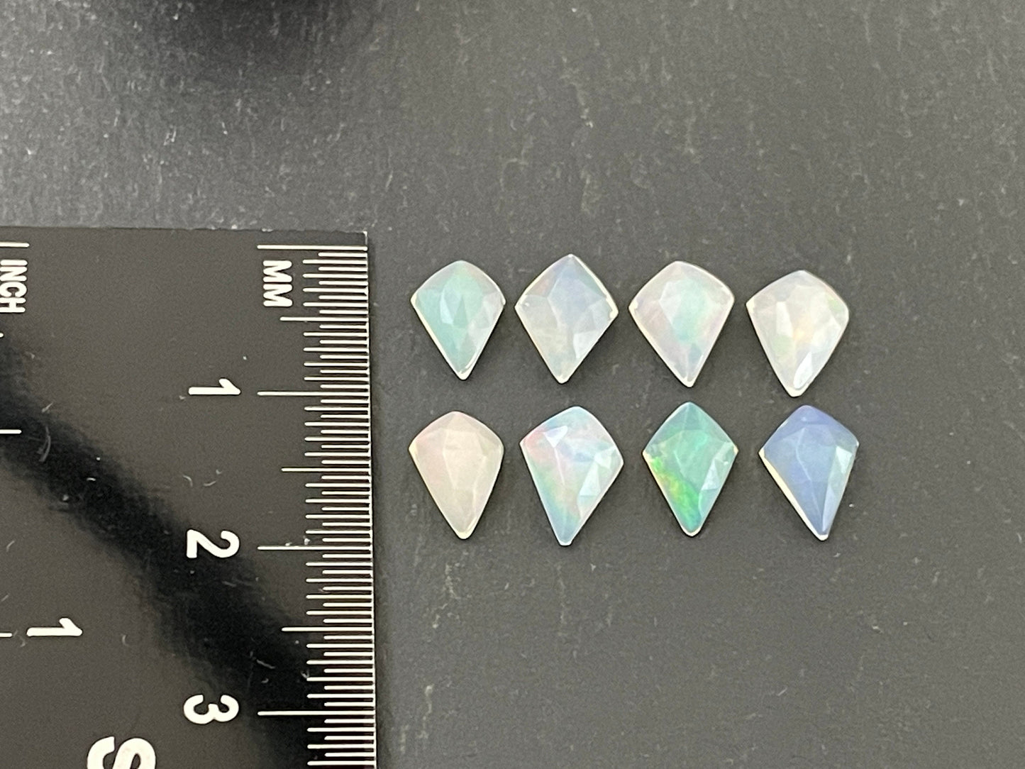 Faceted Ethiopian Opal kite 7.5-8.5mm long cabochon