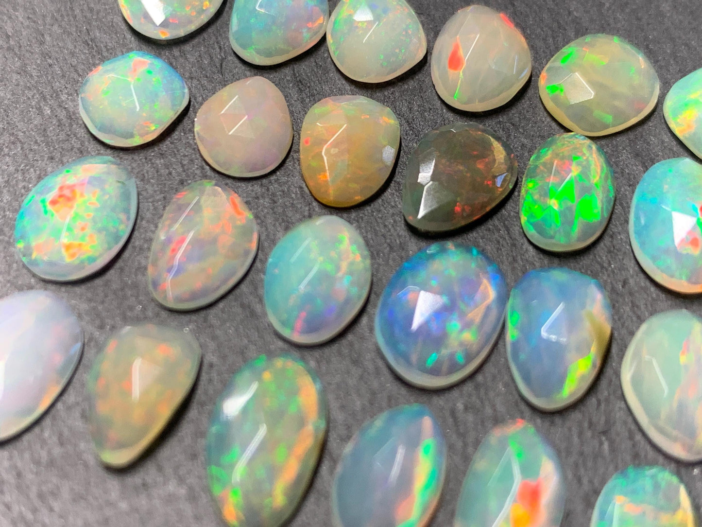 Faceted Ethiopian Opal 9-10mm long cabochon