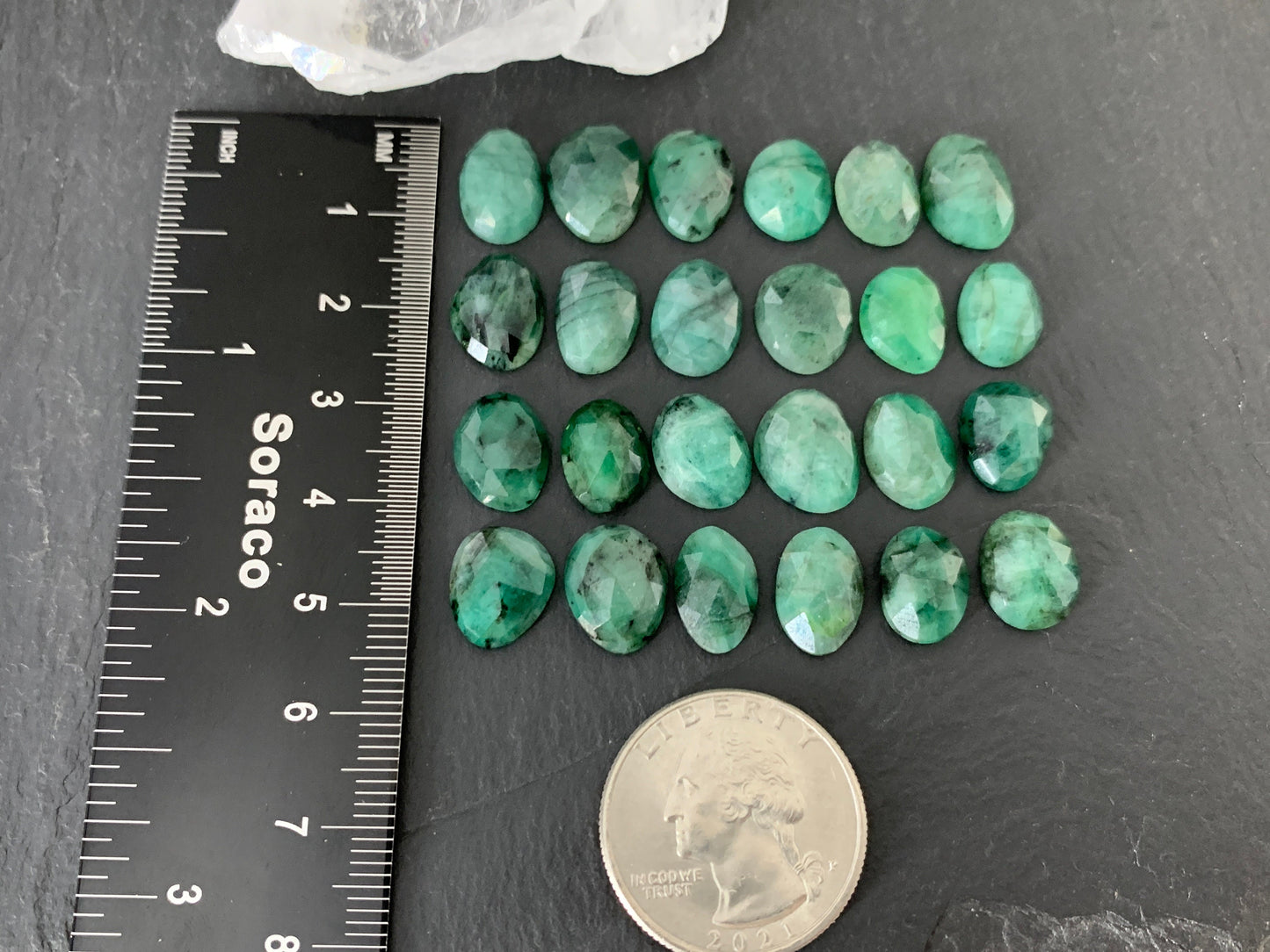 Faceted Emerald oval 11-13mm long cabochon