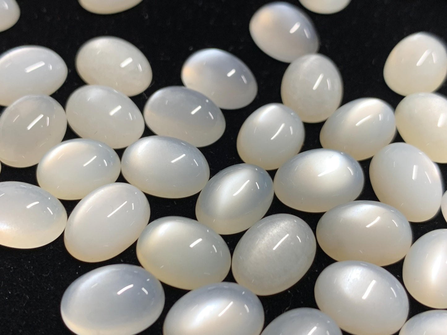 White Moonstone oval 8-11mm long cabochon