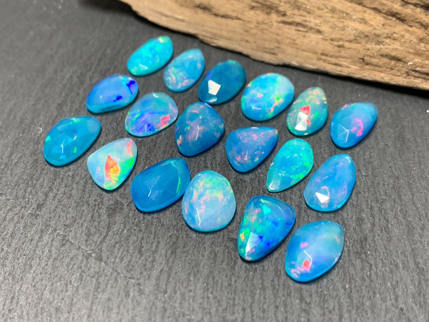 Faceted Blue Ethiopian Opal 11-12mm long cabochon