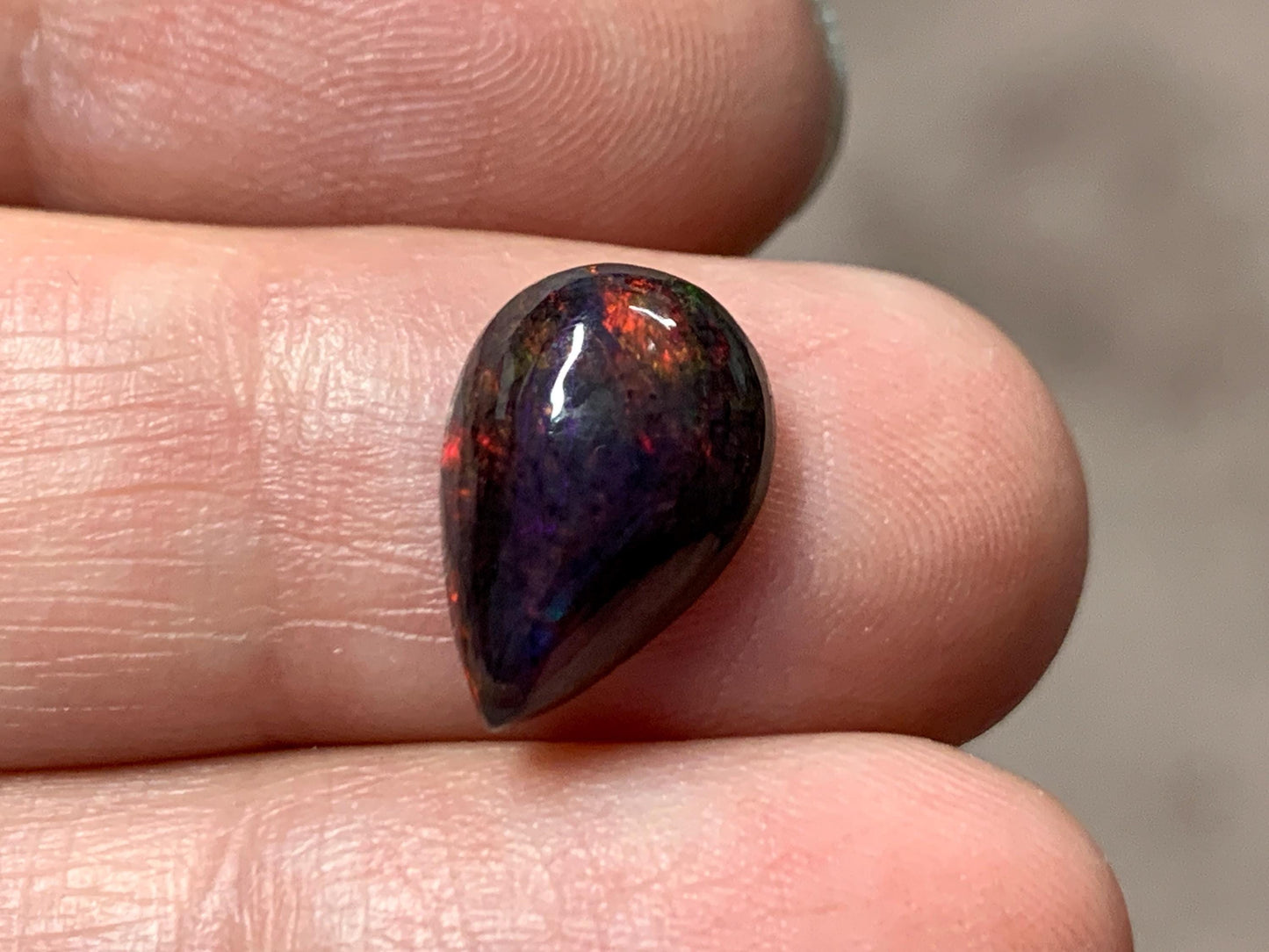 Black Ethiopian Opal pear 8x13x4mm cabochon