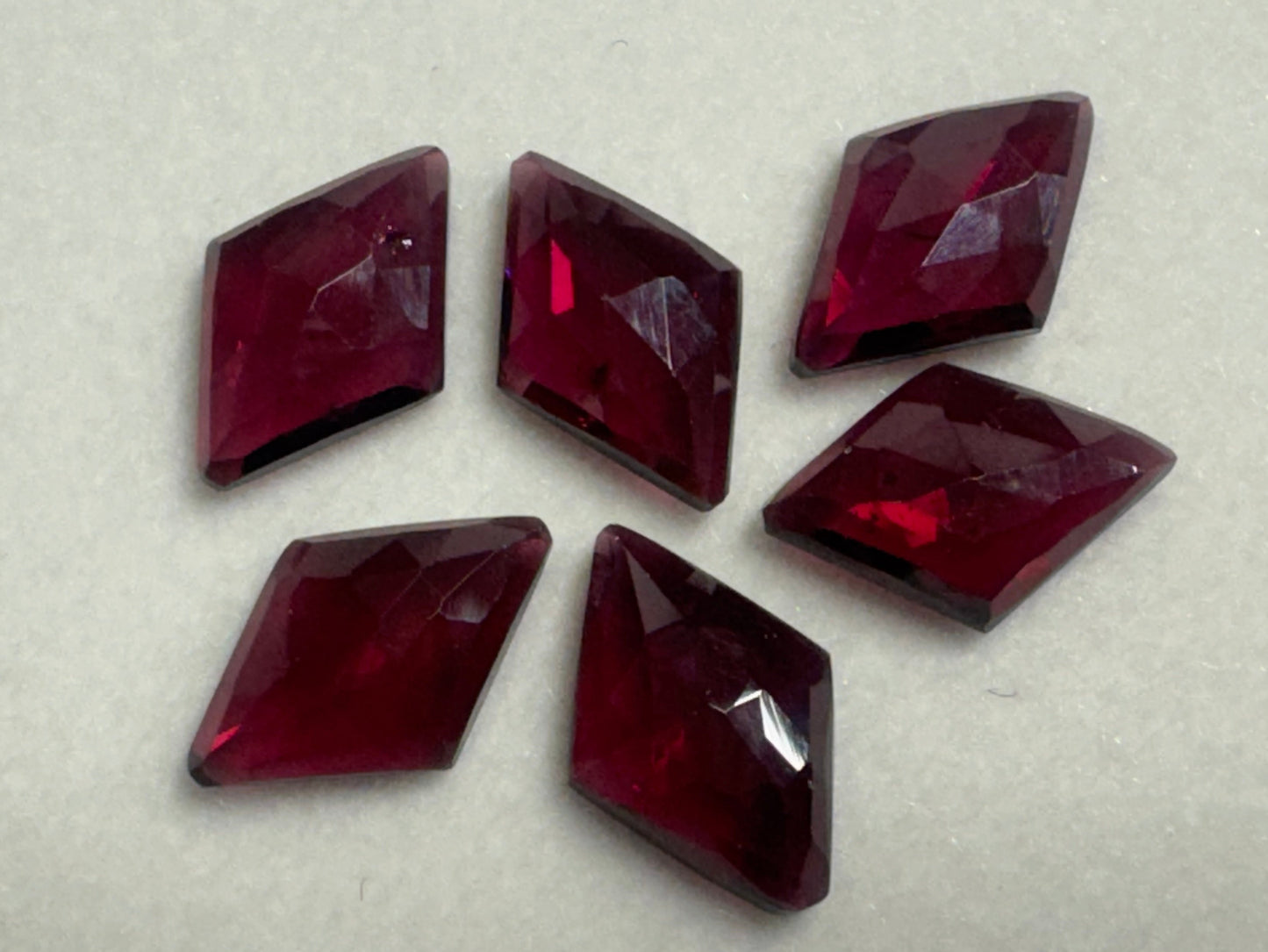 Faceted Rhodolite Garnet rhombus 8x12mm cabochon