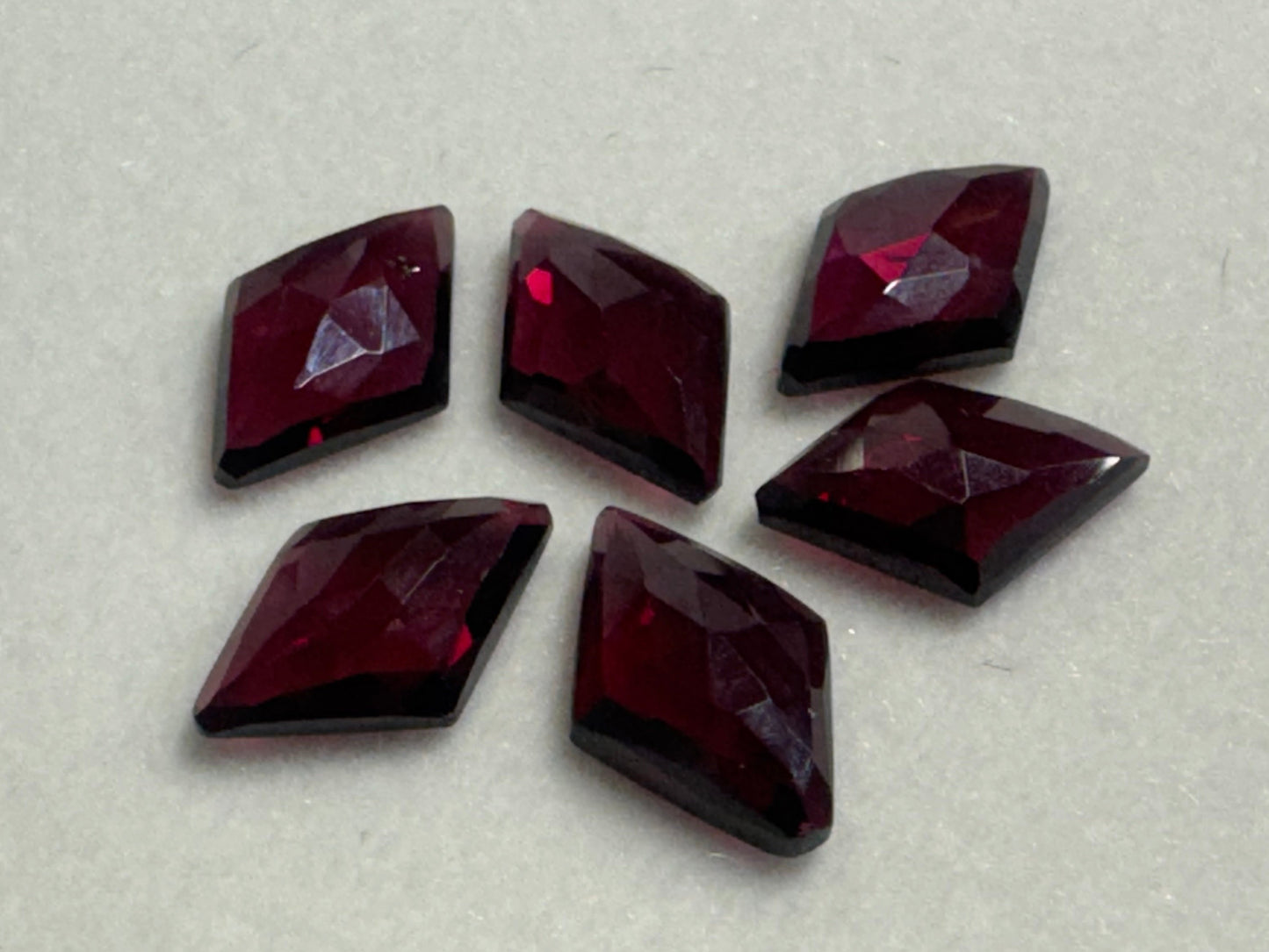 Faceted Rhodolite Garnet rhombus 8x12mm cabochon