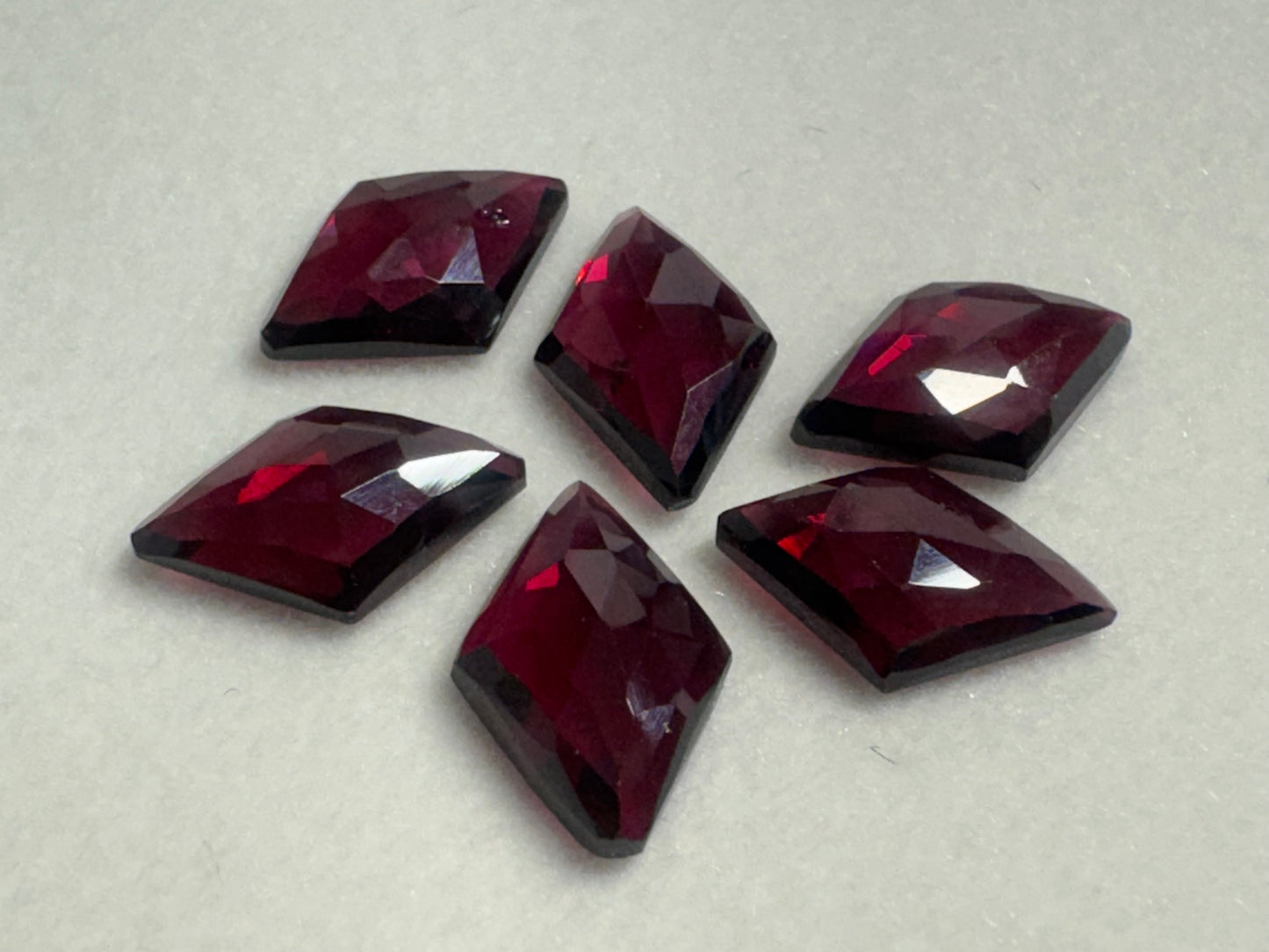 Faceted Rhodolite Garnet rhombus 8x12mm cabochon