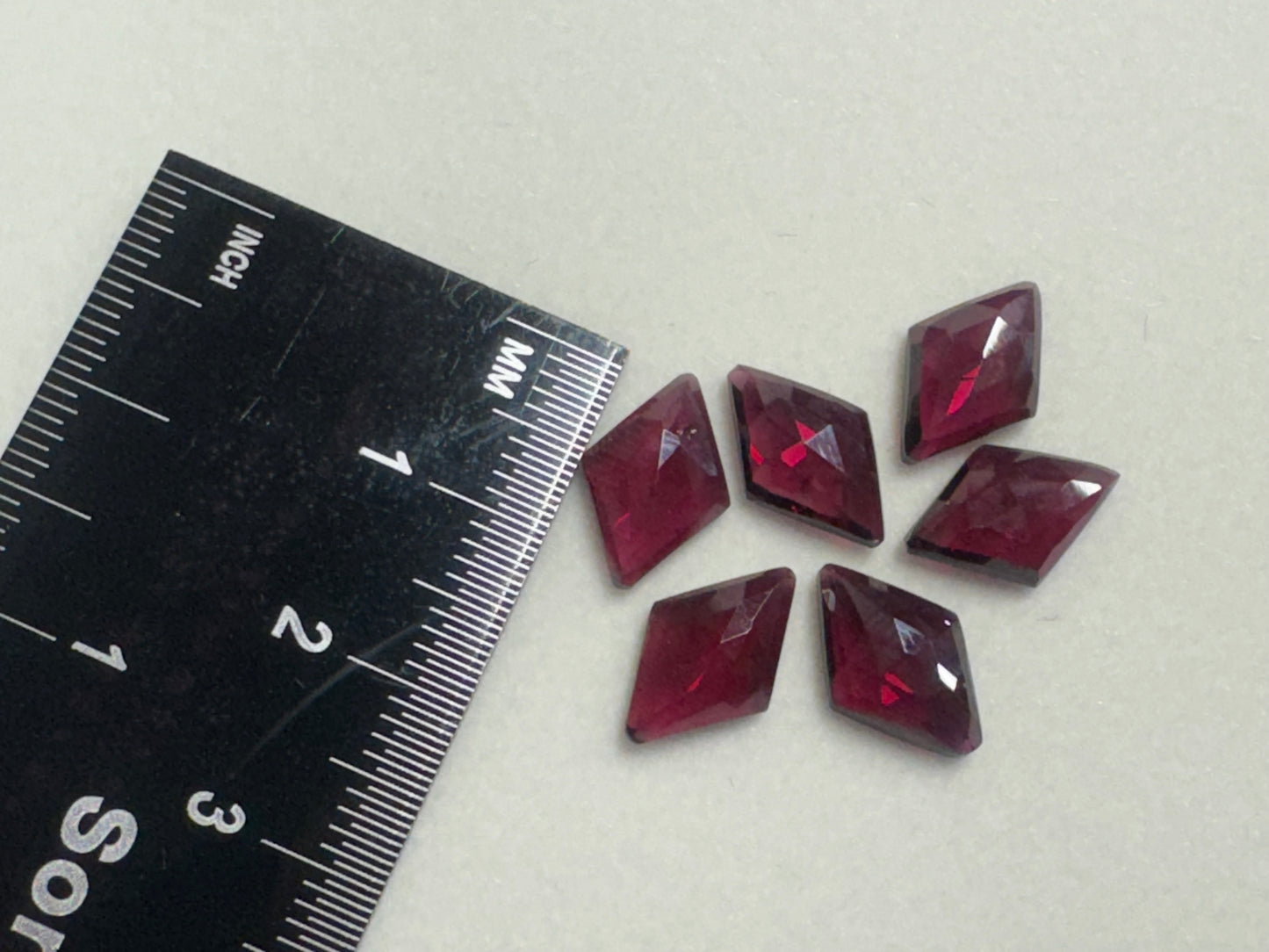 Faceted Rhodolite Garnet rhombus 8x12mm cabochon