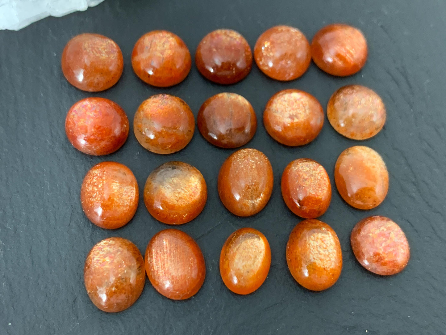 Sunstone round, oval 9-10mm long cabochon