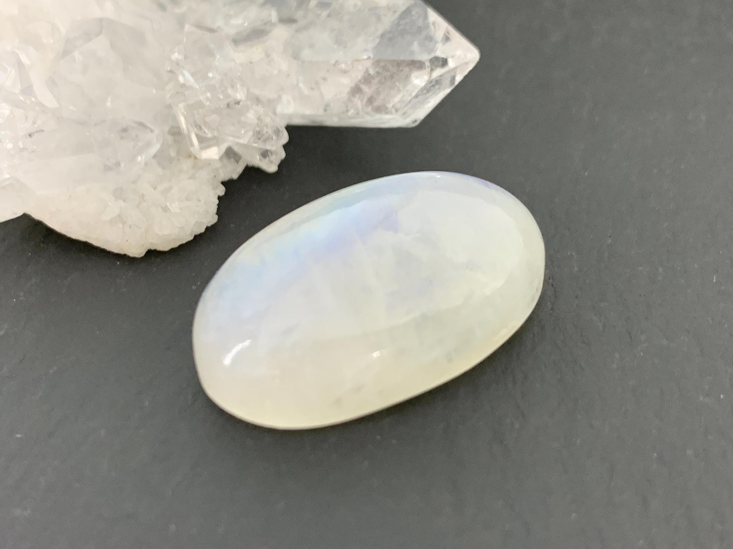 Rainbow Moonstone oval 25x16x8mm cabochon