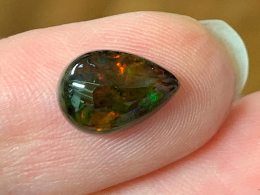 Natural Ethiopian Black Opal 7x11x3.5mm cabochon