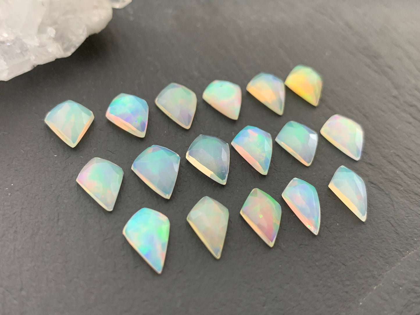 Faceted Welo Opal kite 10-10.5mm cabochon