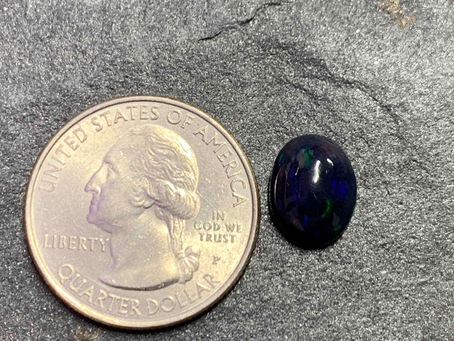 Black Ethiopian Opal oval 9x11x4mm cabochon