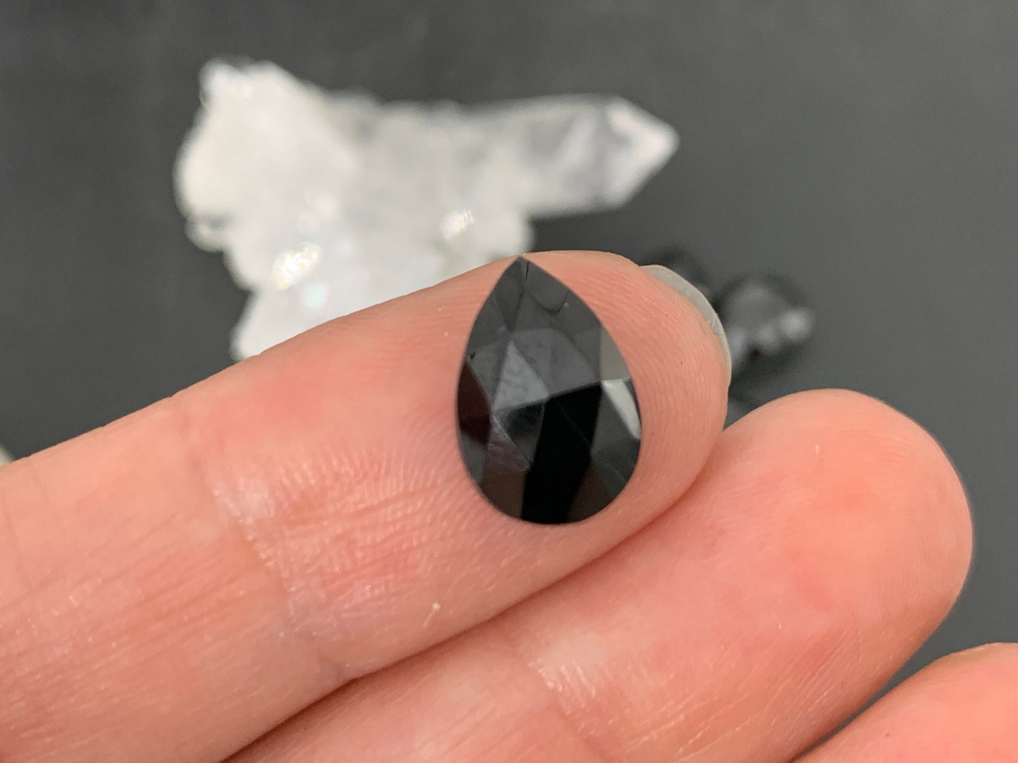 Faceted Black Spinel pear 8x12mm cabochon