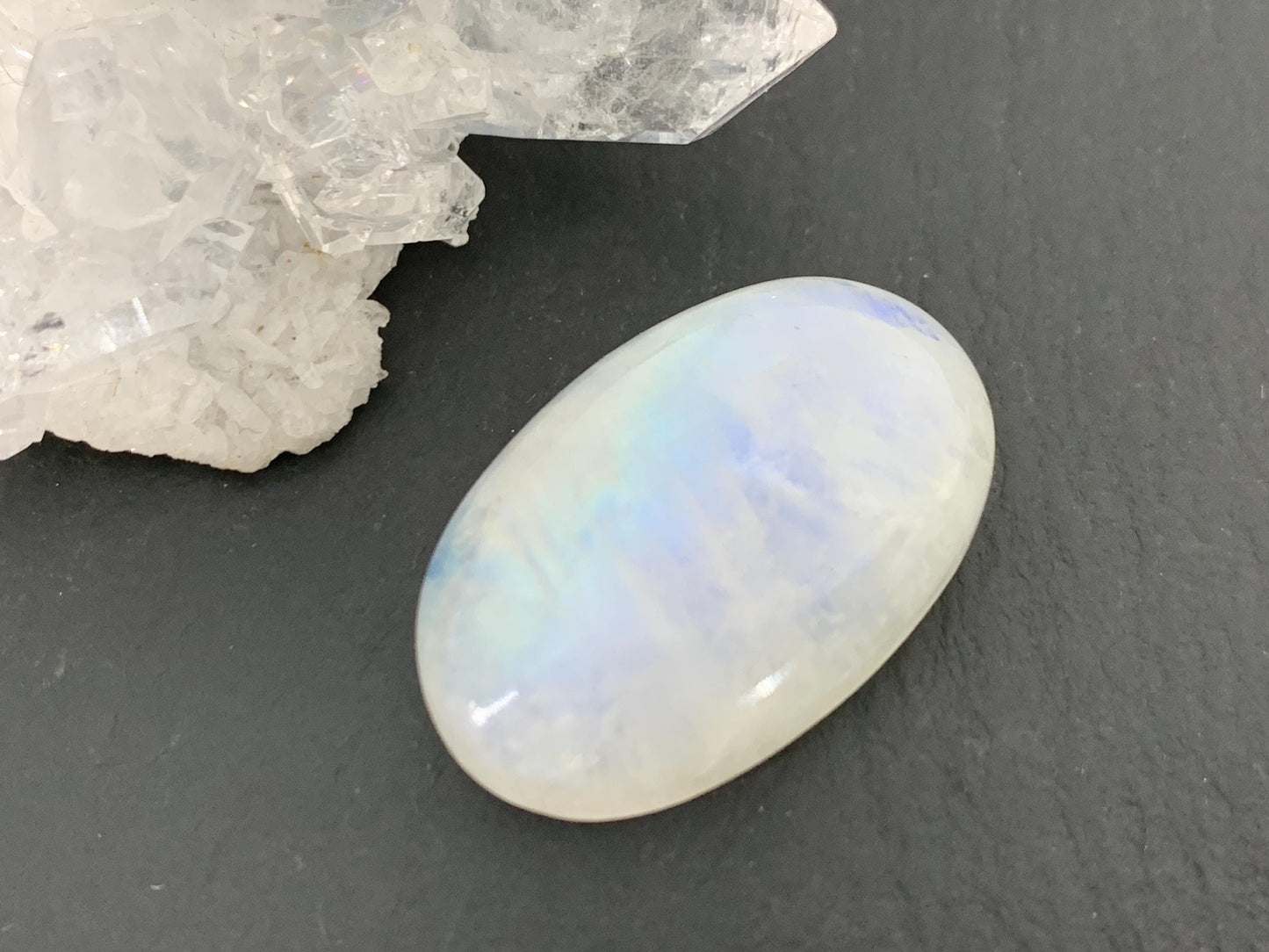 Rainbow Moonstone oval 25x16x8mm cabochon