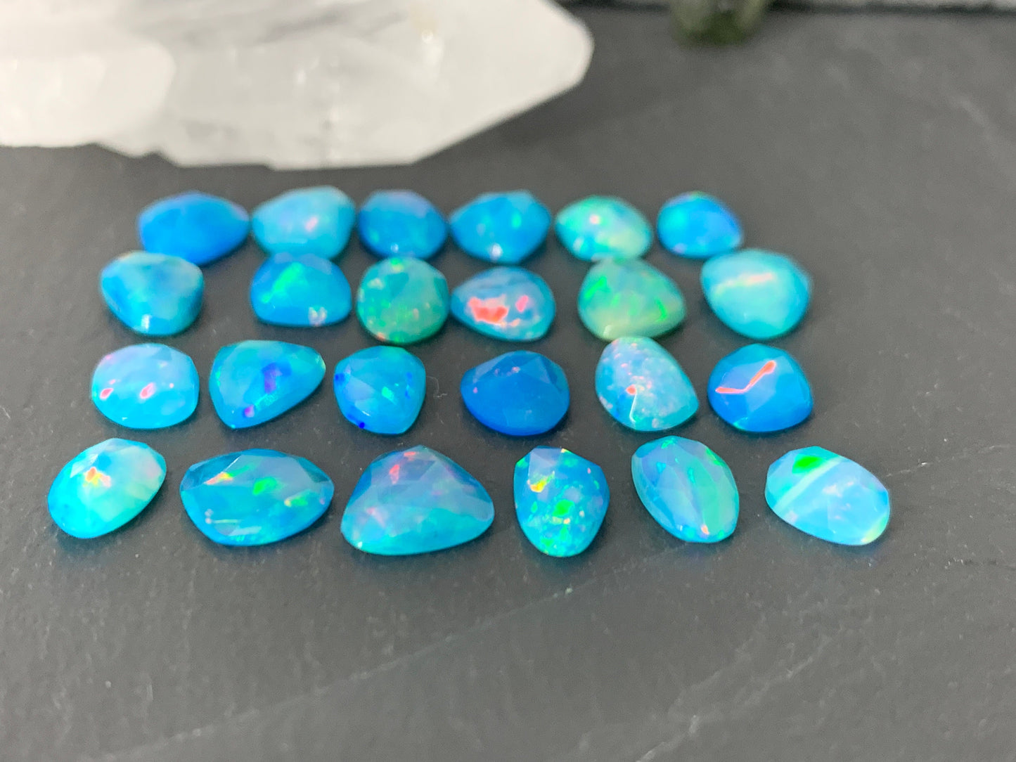 Faceted Blue Ethiopian Opal 9-10mm long cabochon