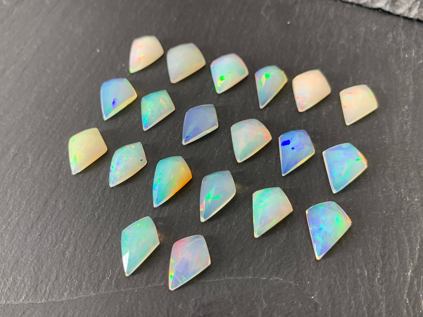 Faceted Ethiopian Opal kite 12-12.5mm long cabochon
