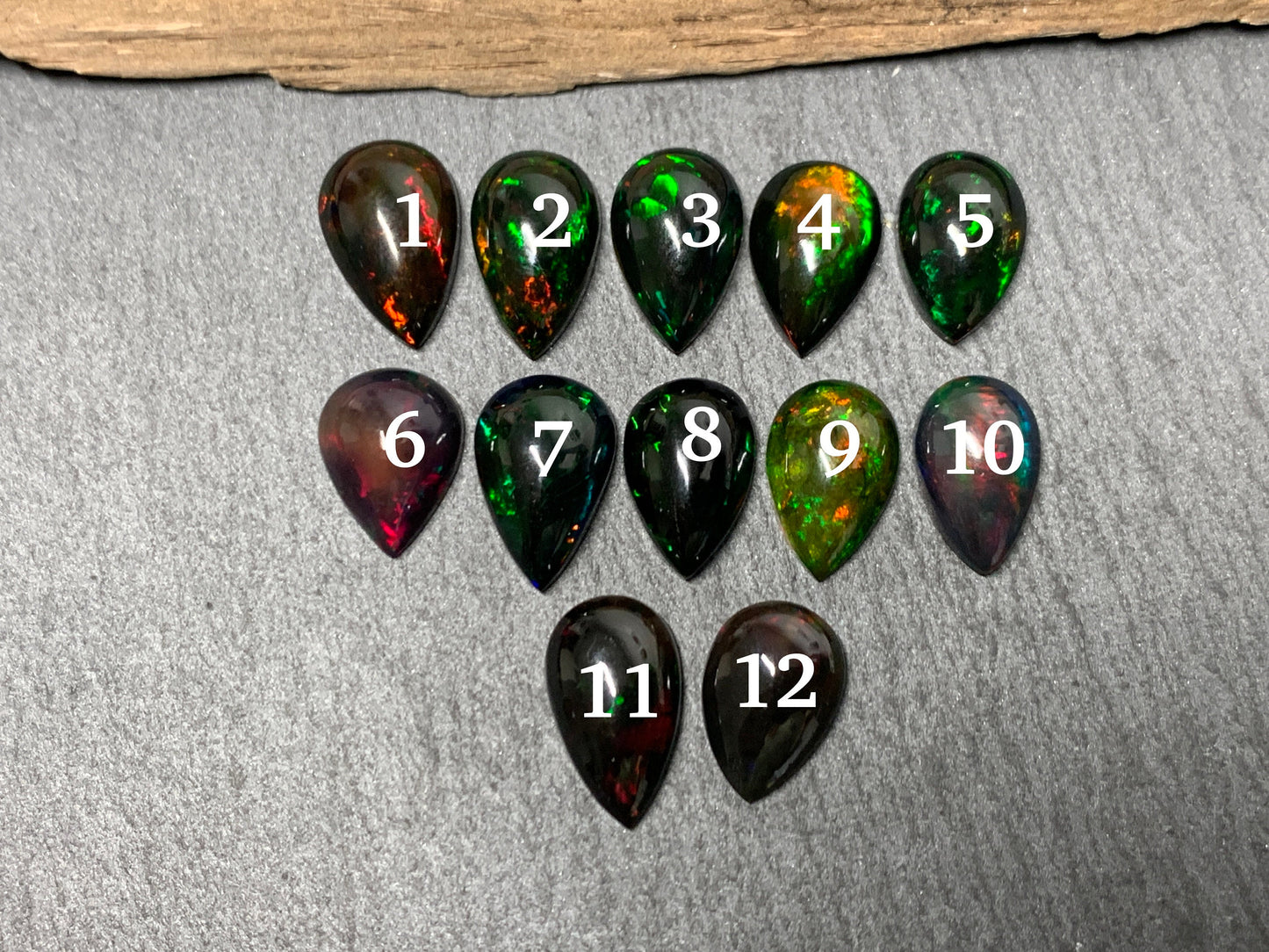 Black Ethiopian Opal pear 12-13mm long cabochon