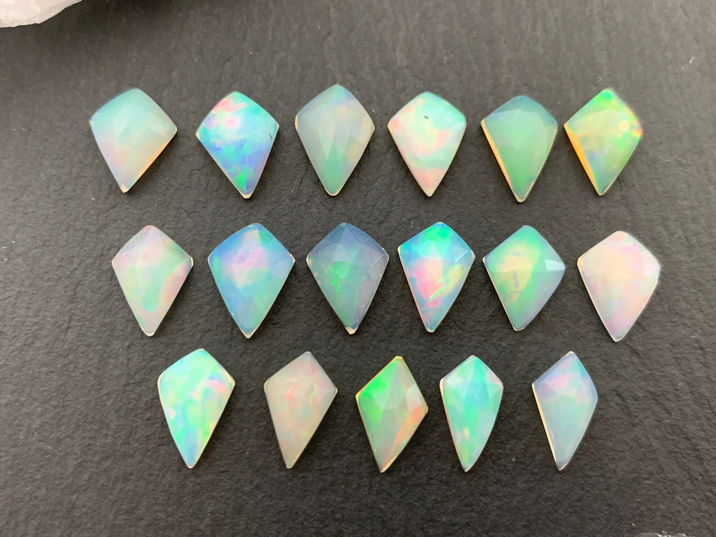 Faceted Welo Opal kite 10-10.5mm cabochon