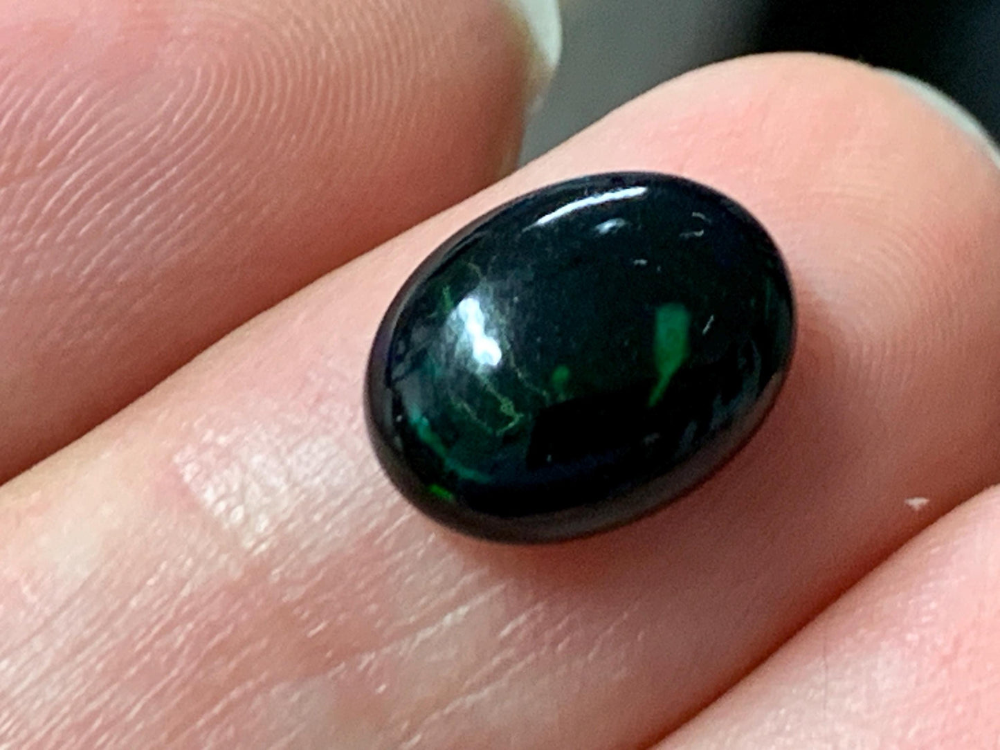 Natural Ethiopian Black Opal 8x11x3.5mm cabochon