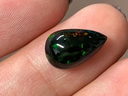 Natural Ethiopian Black Opal 8x14x6mm cabochon