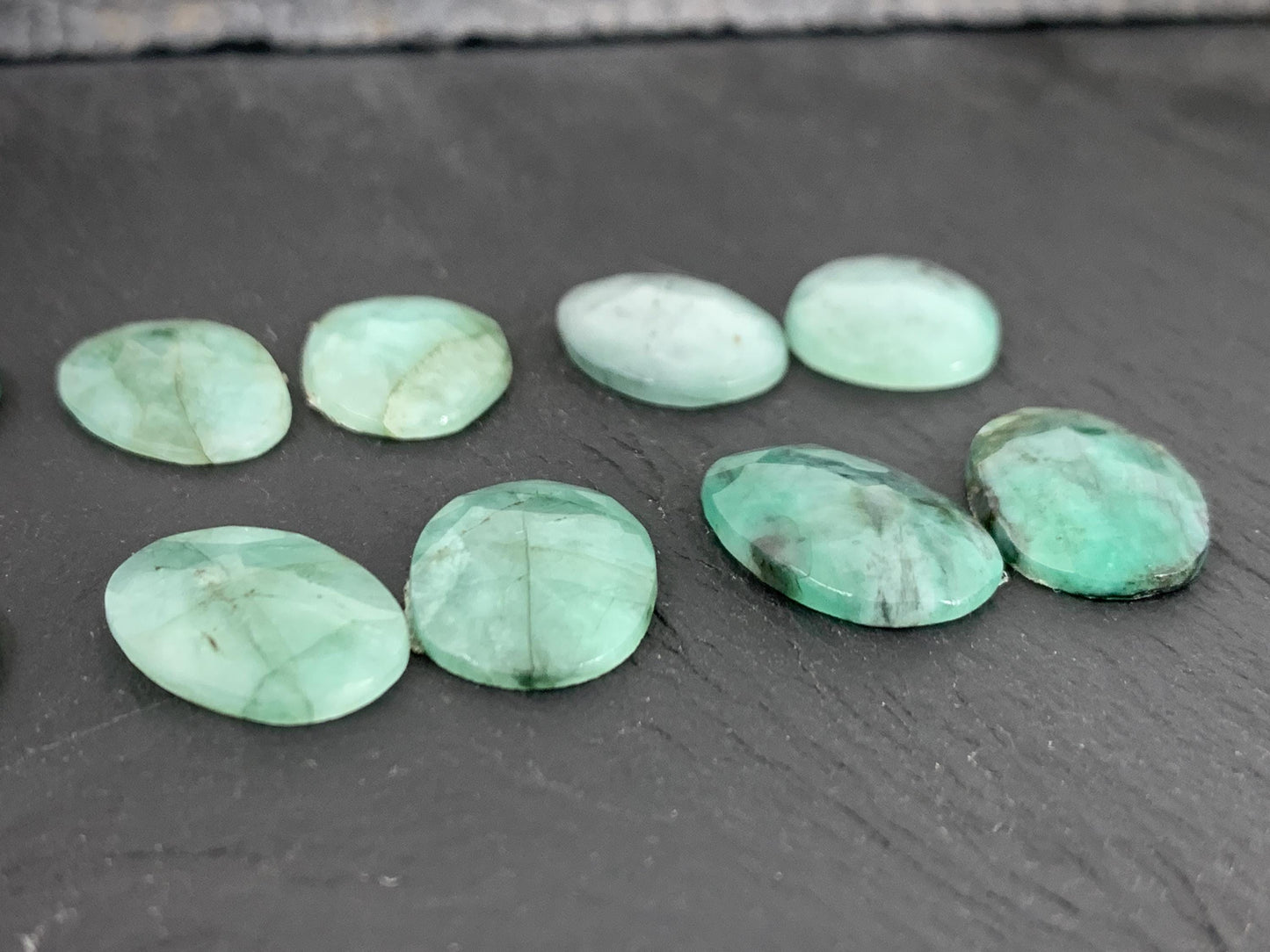 Faceted Emerald pair 15-17mm long cabochon