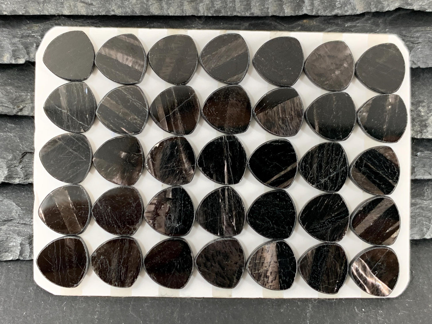 Flat Hypersthene curved triangle 10mm cabochon - Calibrated cabochons