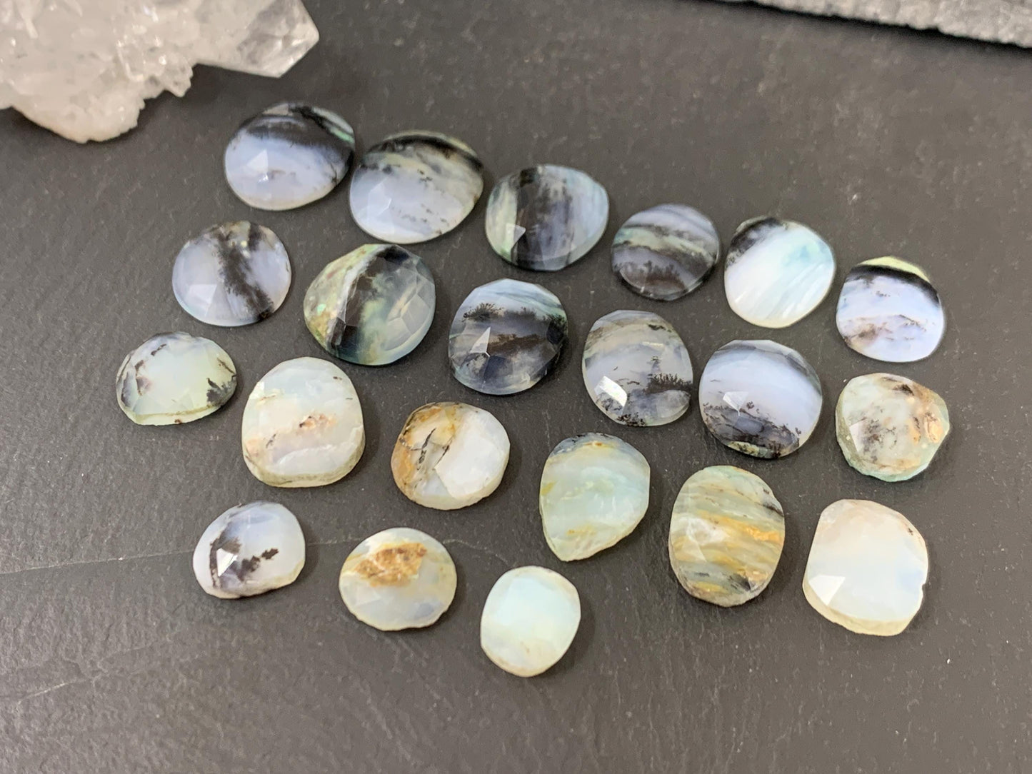 Faceted Peruvian Opal oval, pear 10-17mm long cabochon