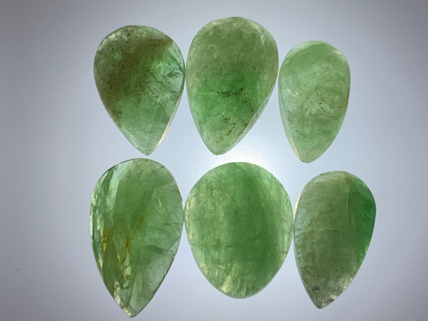 Faceted Tsavorite pear 12-14mm long cabochon