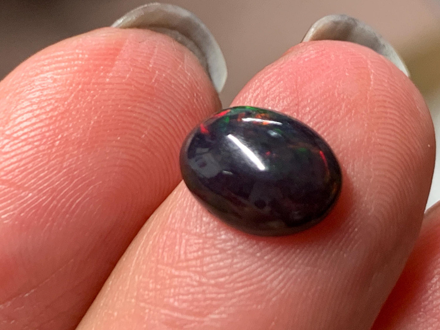 Natural Ethiopian Black Opal 7x9x3mm cabochon