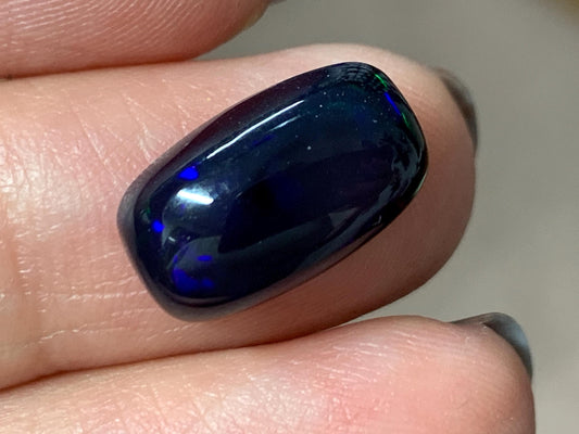 Natural Ethiopian Black Opal 8x14x5mm cabochon