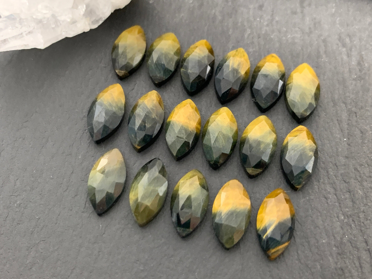 Faceted Yellow Tiger Eye marquise 7x14mm cabochon