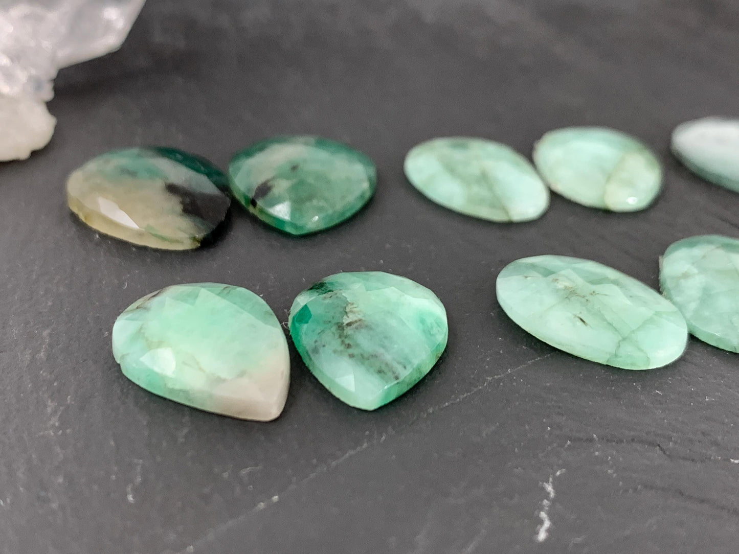 Faceted Emerald pair 15-17mm long cabochon