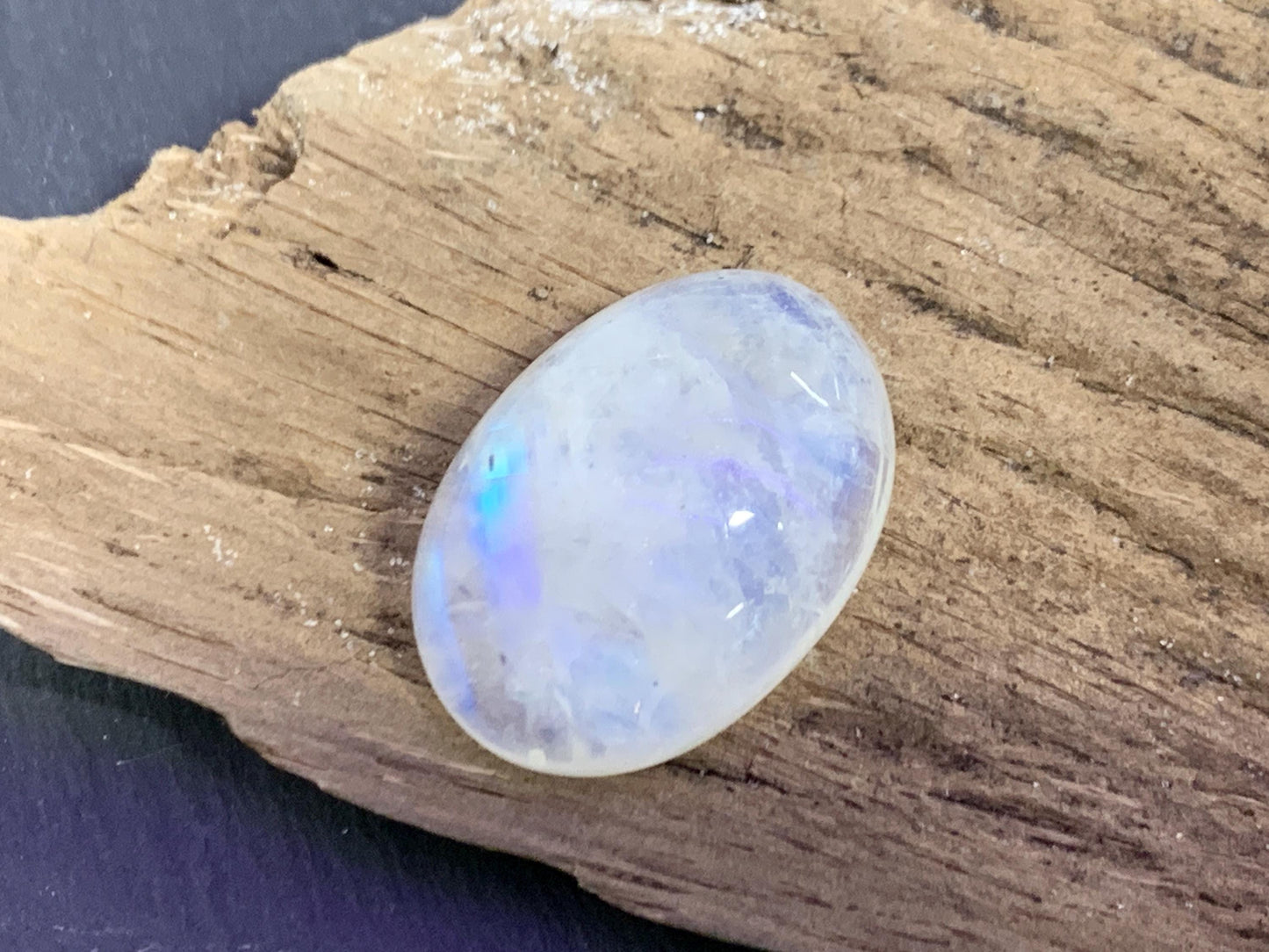 Rainbow Moonstone oval 24x18x9mm cabochon