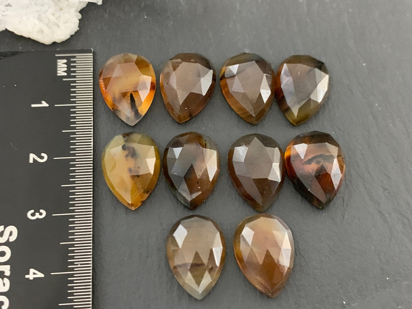 Faceted Montana Agate pear 10x14mm cabochon