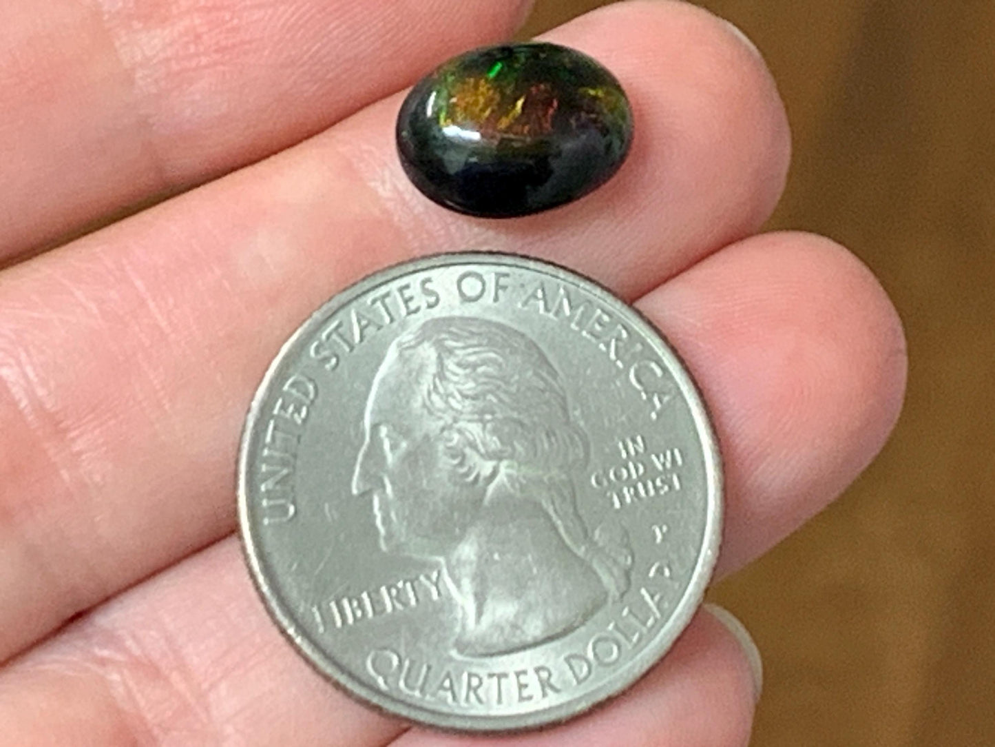 Natural Ethiopian Black Opal 9x12x5mm cabochon