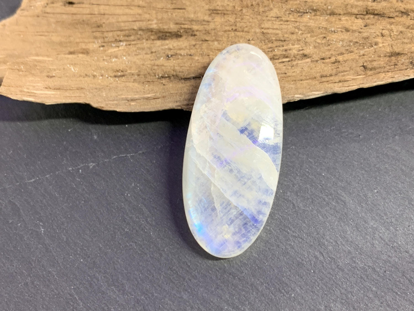 Rainbow Moonstone oval 37x17x7mm cabochon
