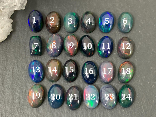 Black Ethiopian Opal oval 4x6mm cabochon