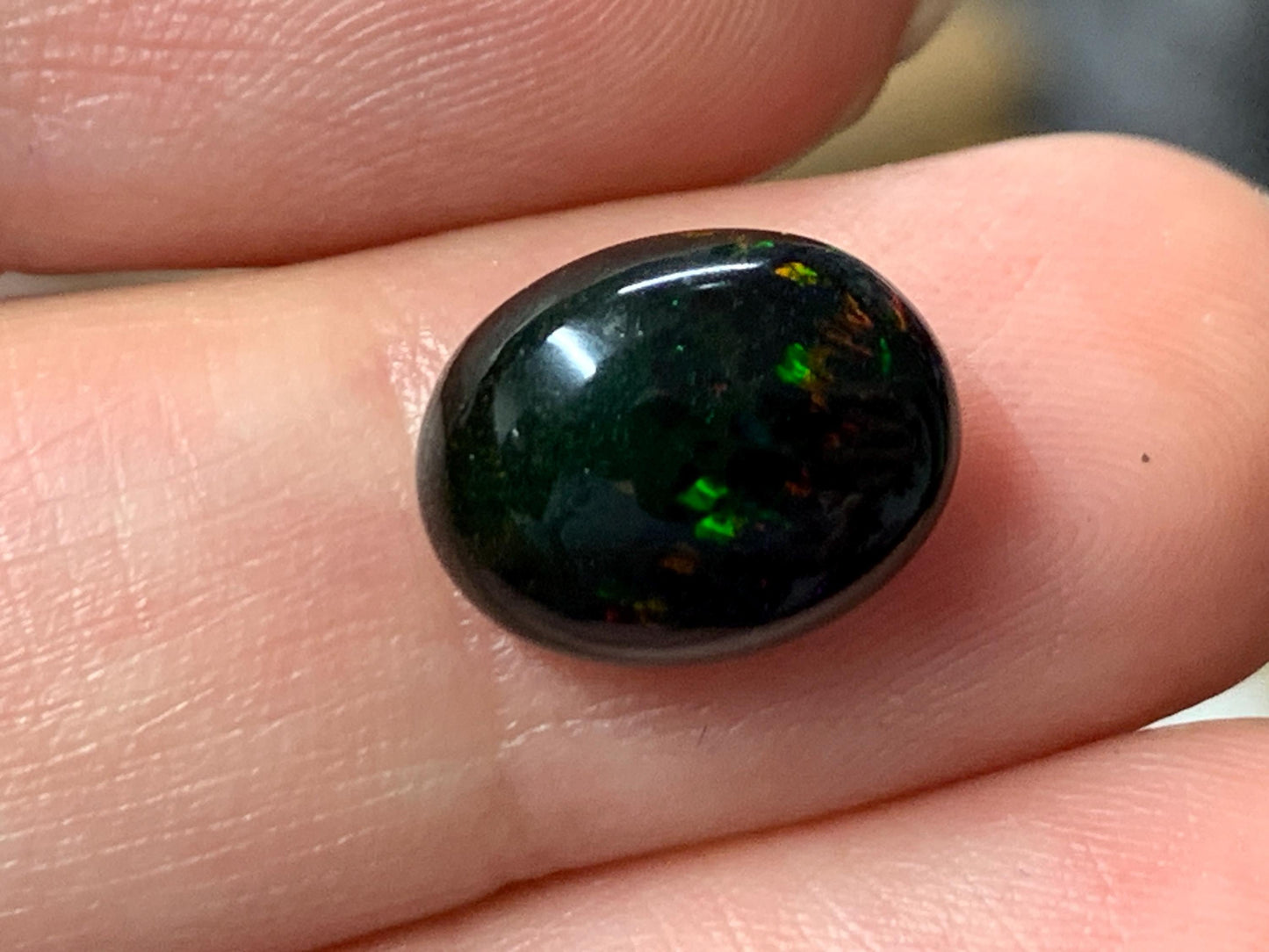 Natural Ethiopian Black Opal 9x12x5mm cabochon
