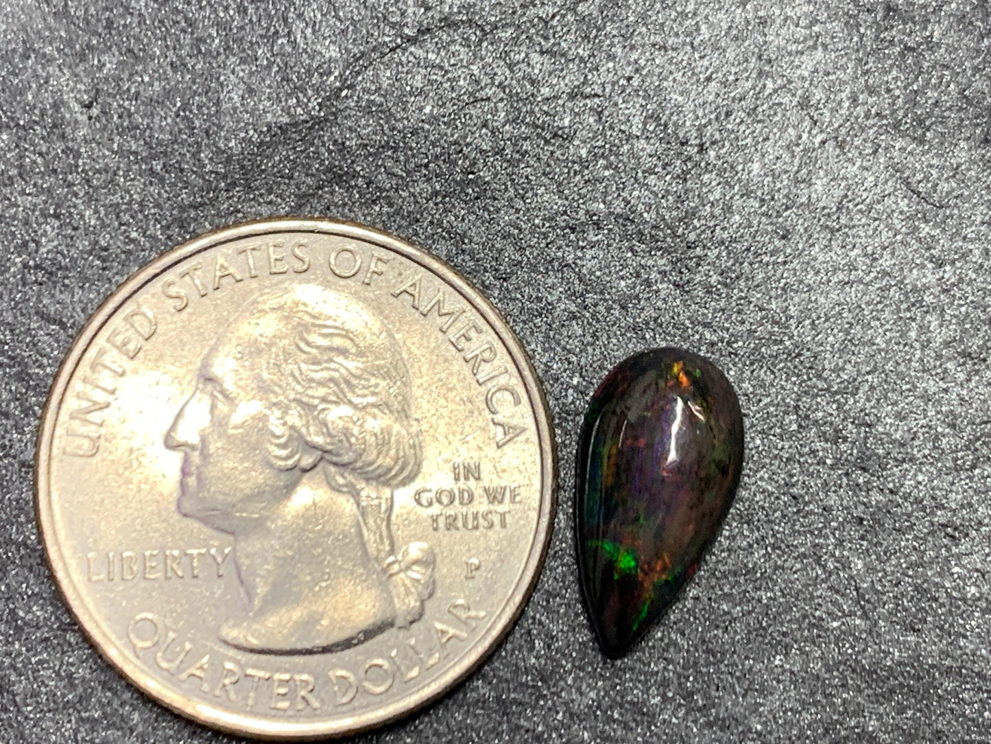 Black Ethiopian Opal pear 7x14x4mm cabochon
