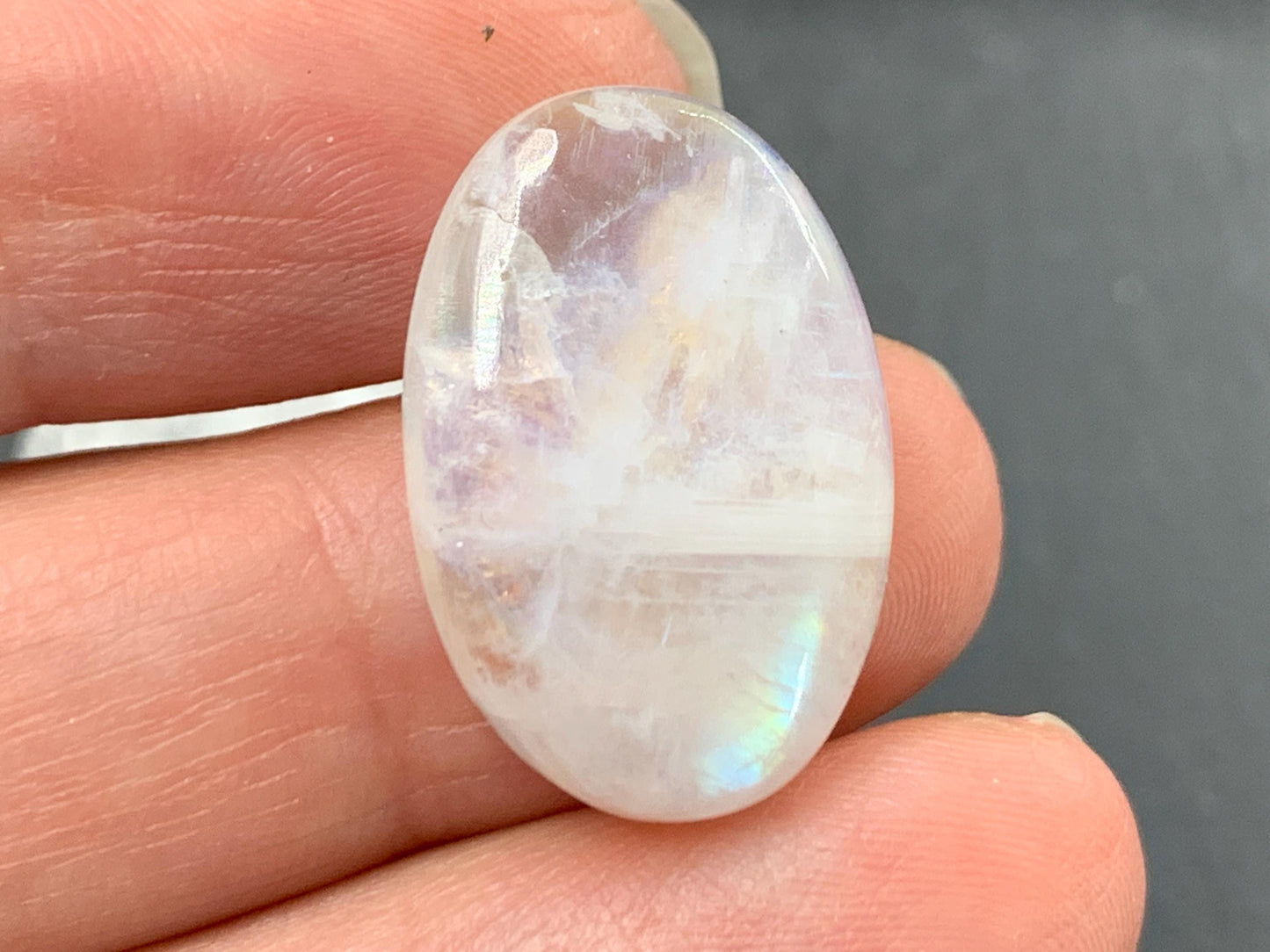 Rainbow Moonstone oval 23x16x6mm cabochon