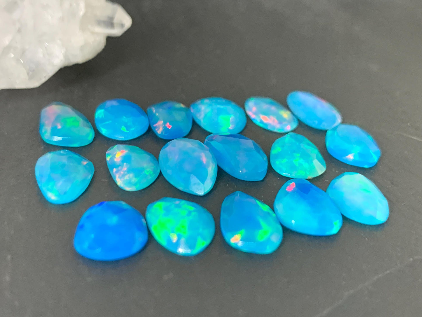 Faceted Blue Ethiopian Opal 9-10mm long cabochon