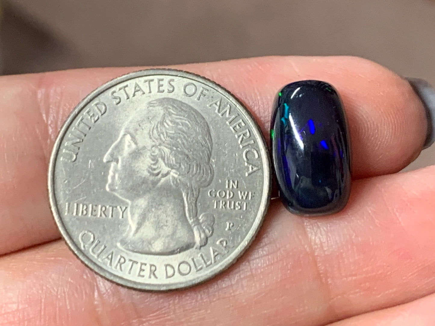 Natural Ethiopian Black Opal 8x14x5mm cabochon