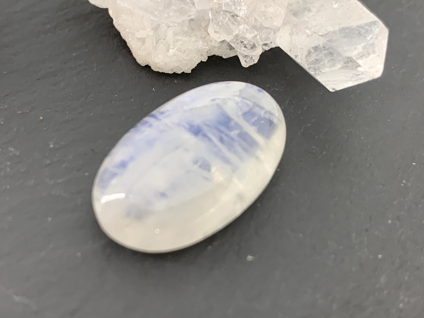 Rainbow Moonstone 24x15x7mm cabochon
