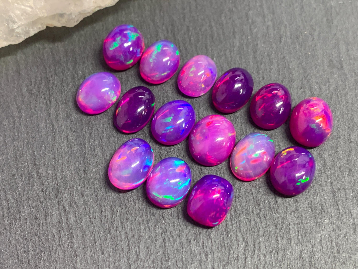 Ethiopian Opal oval 8x10mm cabochon - Natural Opal smoked to purple color
