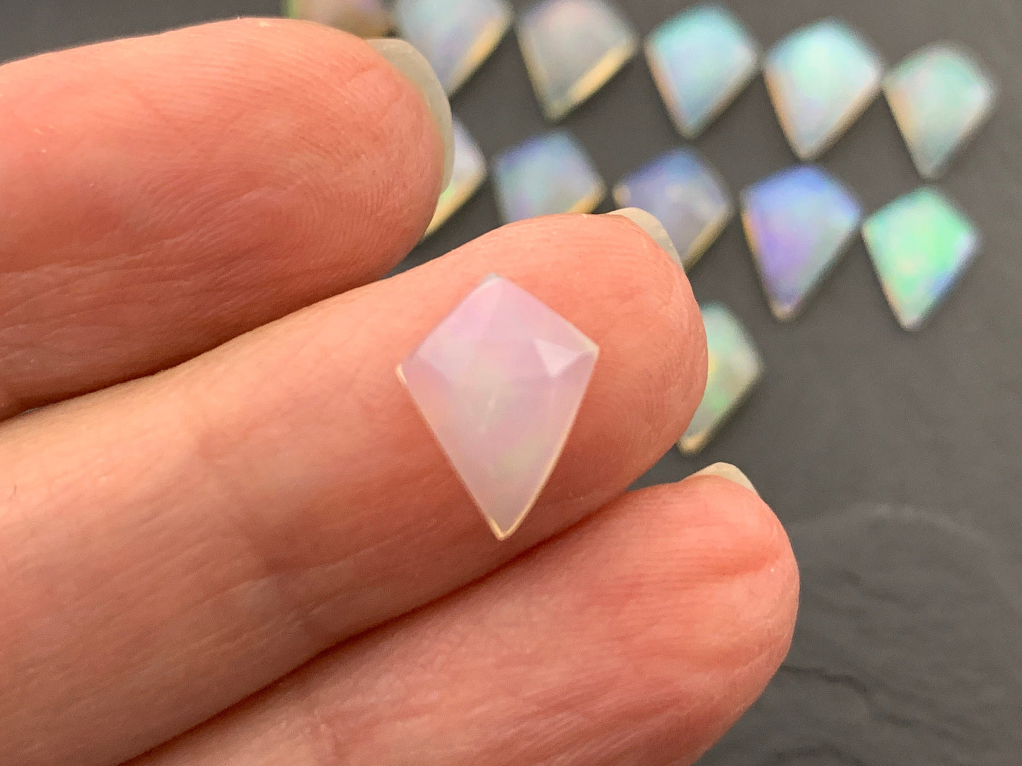 Faceted Welo Opal kite 11-11.8mm cabochon