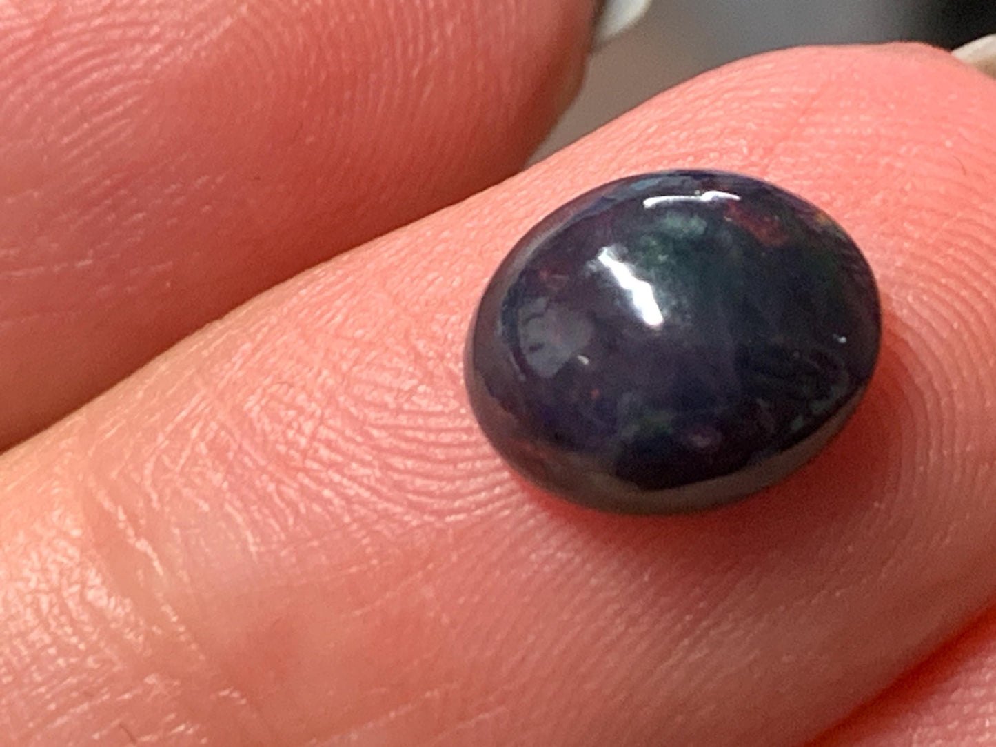Natural Ethiopian Black Opal 7x9x4mm cabochon